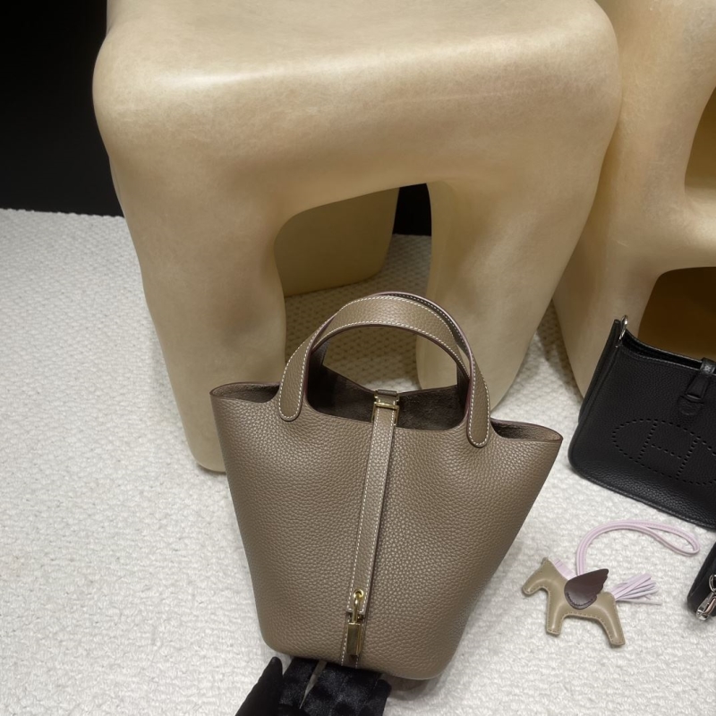H**mes shopping bags